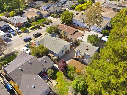 an aerial view of residential house with outdoor space