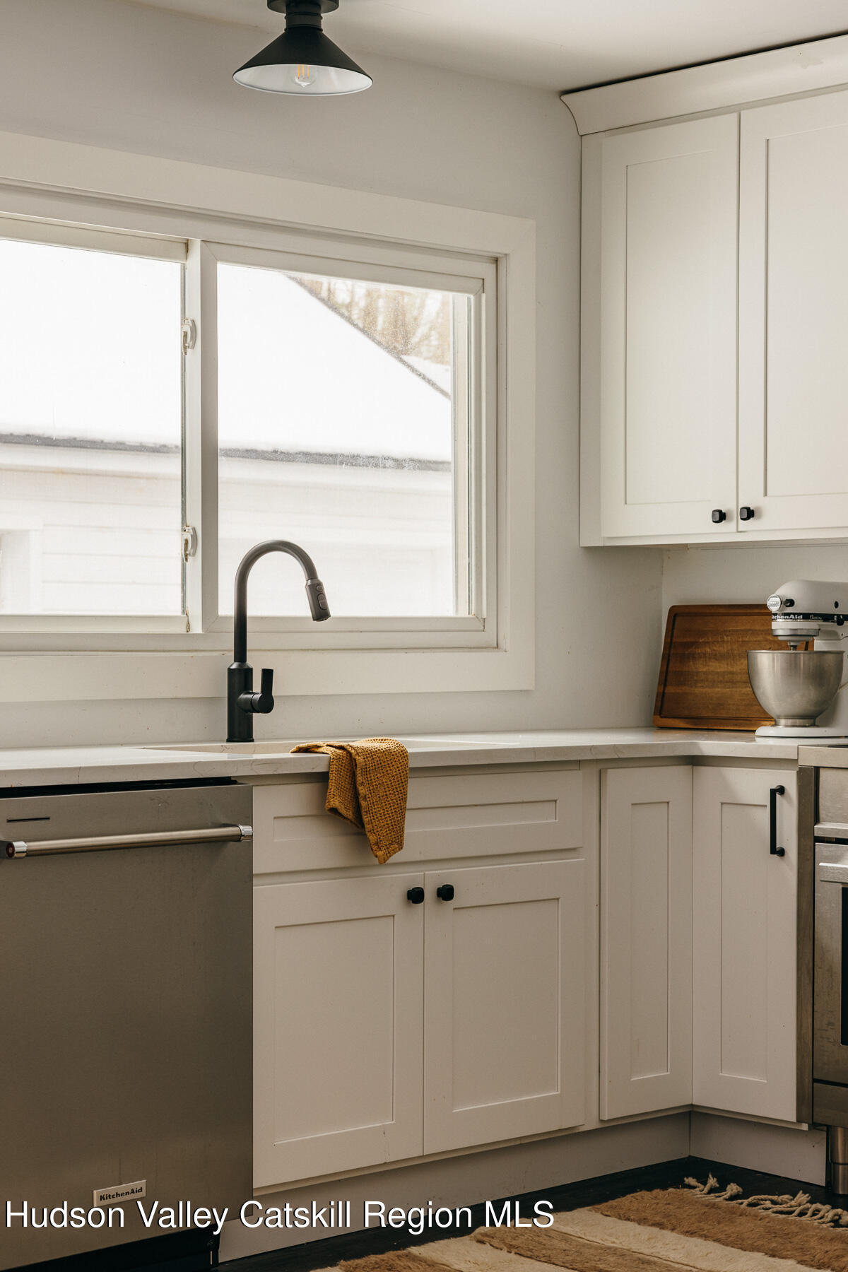 354 Slate Quarry Road Rhinebeck, NY 12572 - Photo 11 of 33 a kitchen with a sink and window