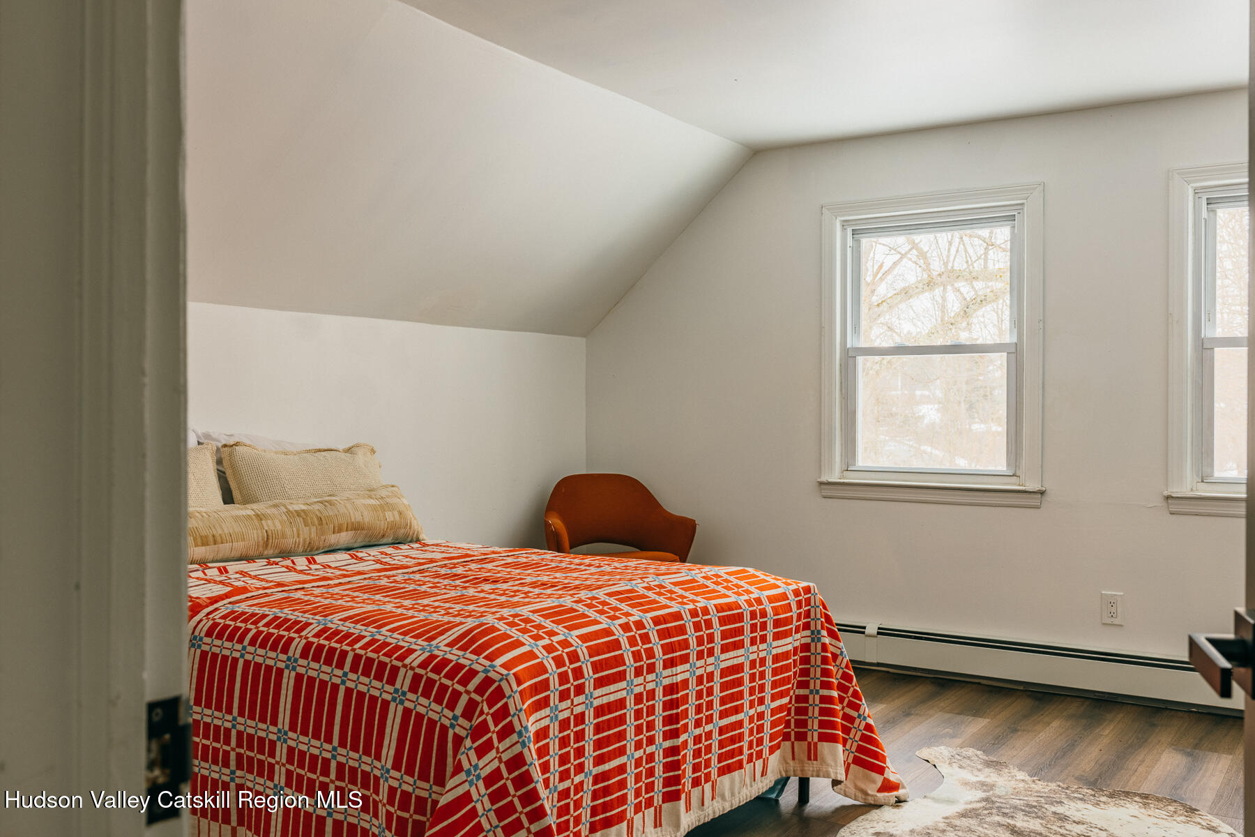 354 Slate Quarry Road Rhinebeck, NY 12572 - Photo 30 of 33 a bedroom with a bed and window
