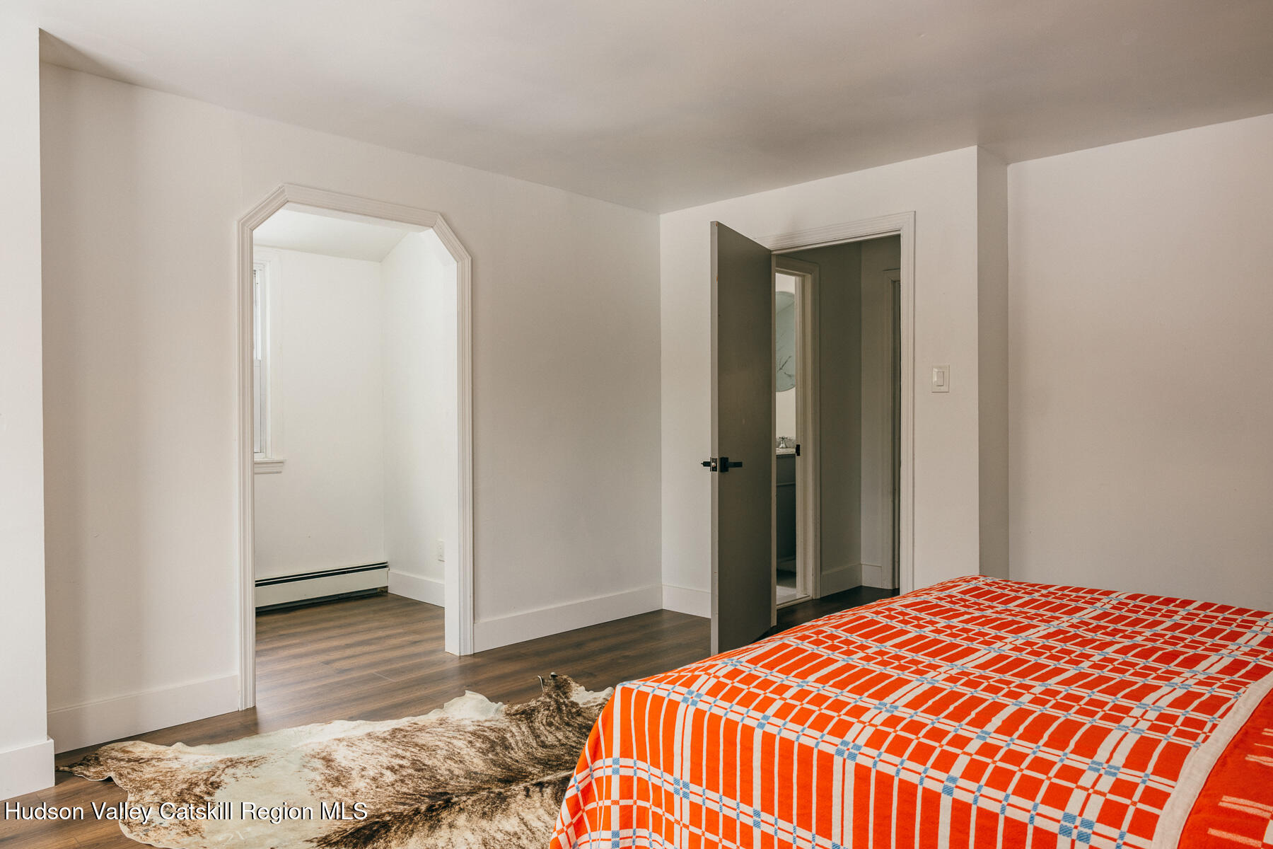 354 Slate Quarry Road Rhinebeck, NY 12572 - Photo 31 of 33 a bedroom with a bed and a dresser