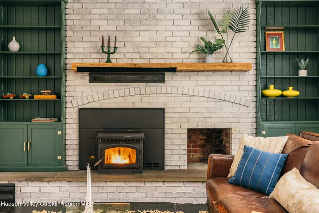 a living room with a fireplace