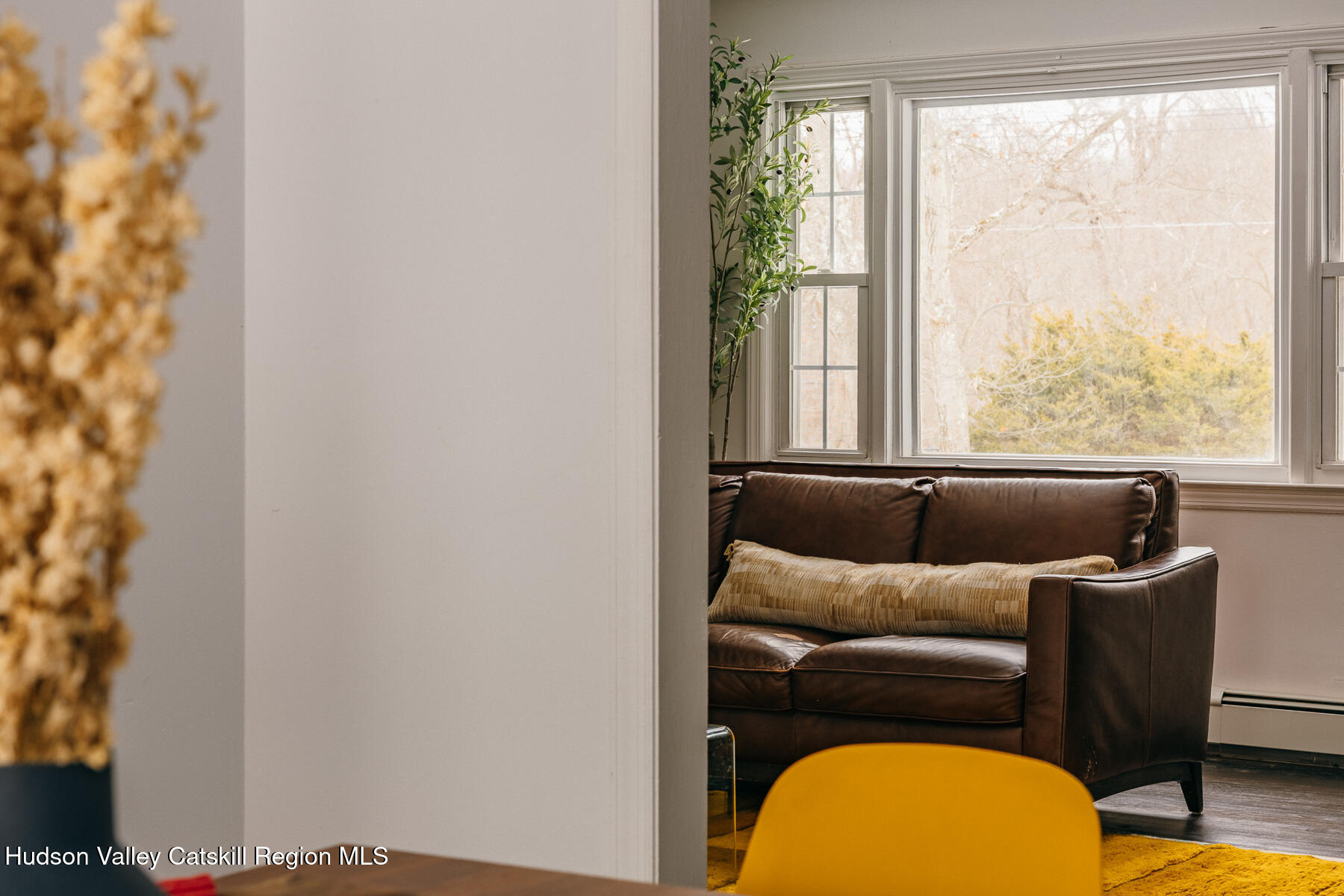 354 Slate Quarry Road Rhinebeck, NY 12572 - Photo 6 of 33 a living room with furniture and a window