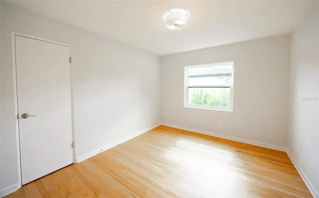 a view of a room that has a window in it