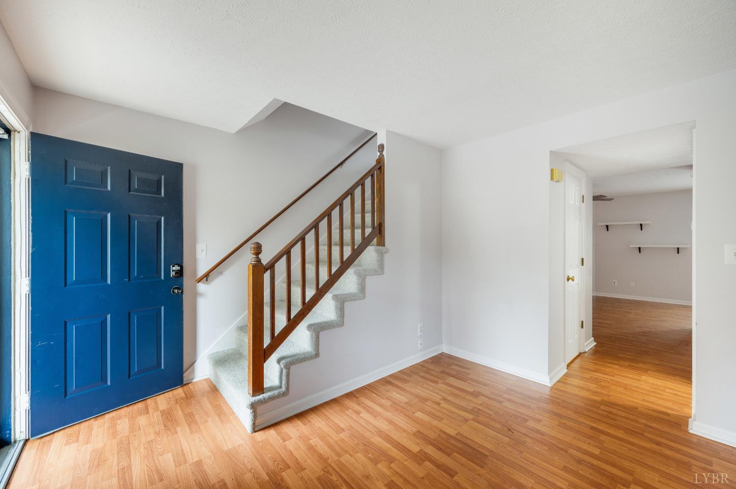 102 Goose Ridge Drive Forest, VA 24551 - Photo 13 of 57 a view of a hallway with wooden floor and staircase