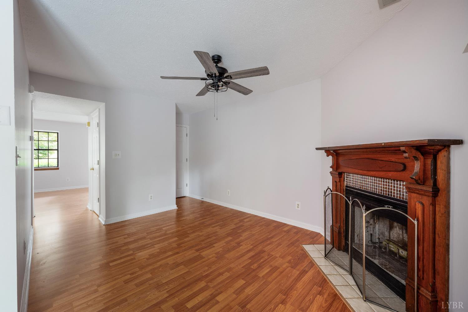 102 Goose Ridge Drive Forest, VA 24551 - Photo 18 of 57 a view of empty room with wooden floor and fan