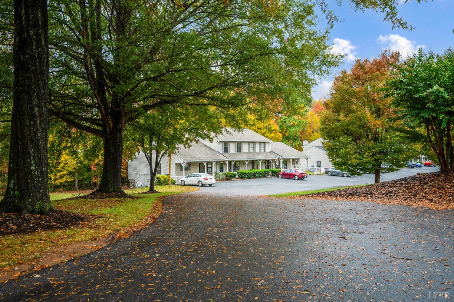 102 Goose Ridge Drive Forest, VA 24551 - Photo 2 of 57 a view of a house with a yard and large tree