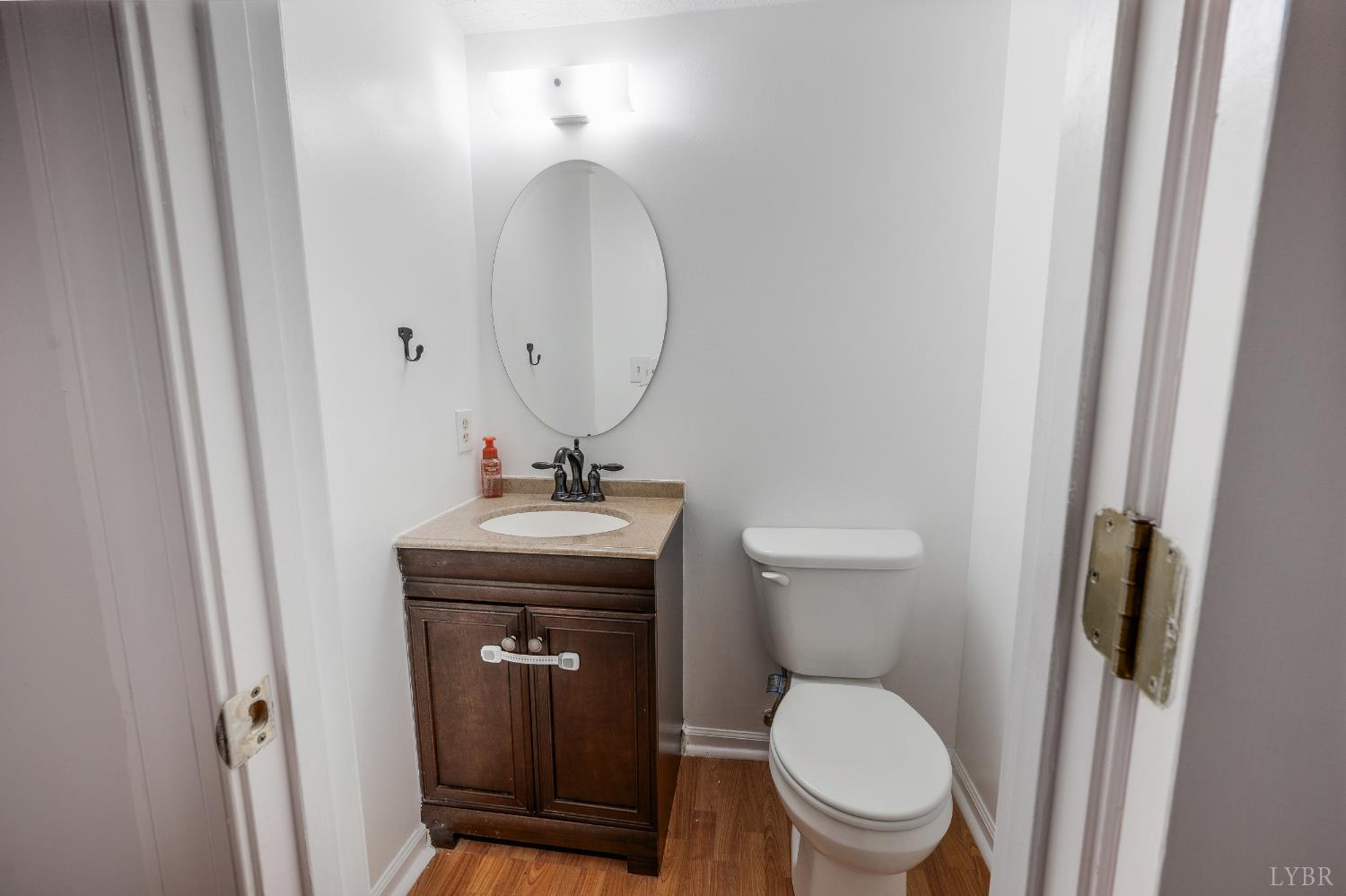 102 Goose Ridge Drive Forest, VA 24551 - Photo 24 of 57 a bathroom with a toilet a sink and mirror