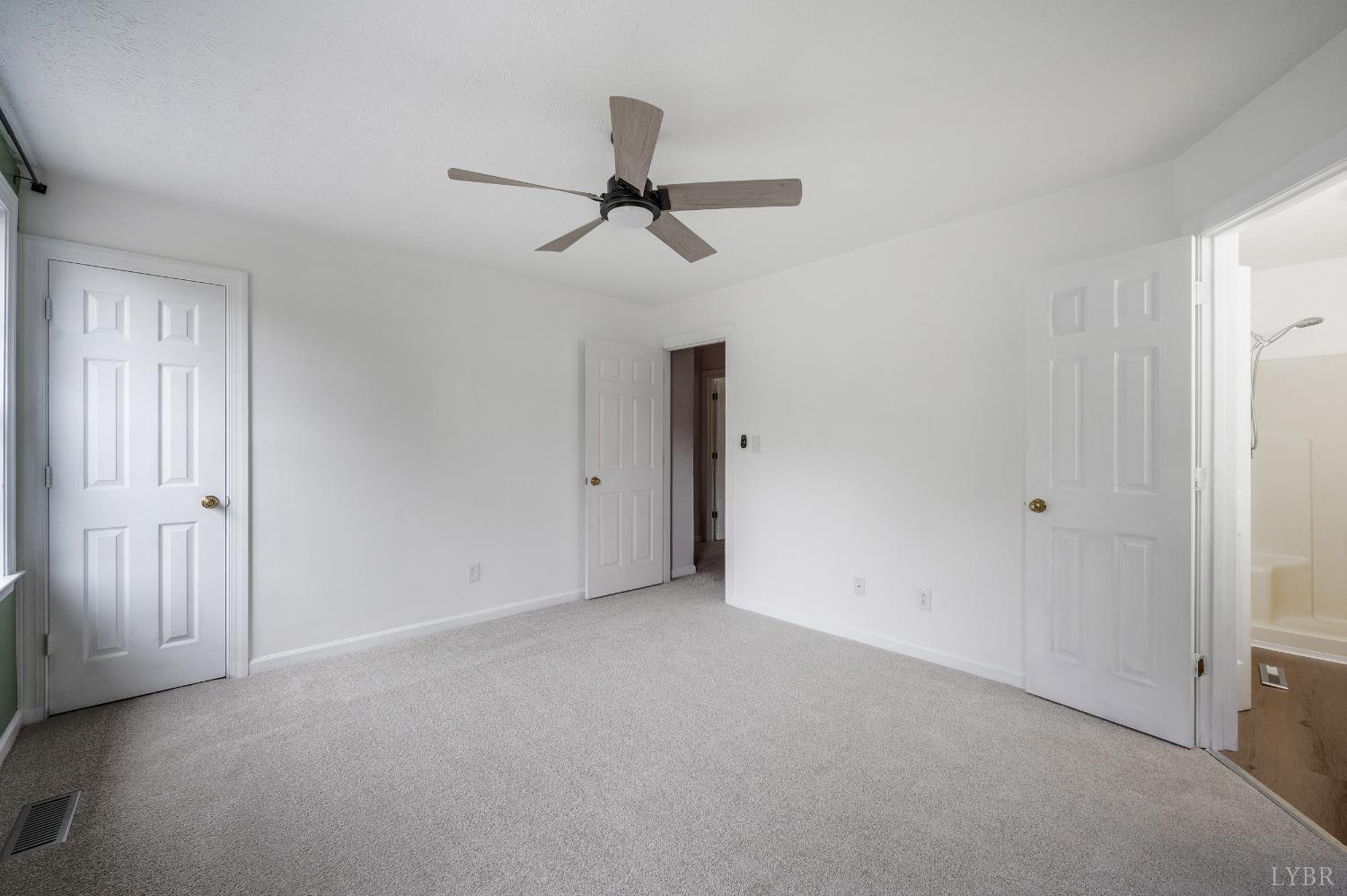 102 Goose Ridge Drive Forest, VA 24551 - Photo 28 of 57 a view of empty room with ceiling fan