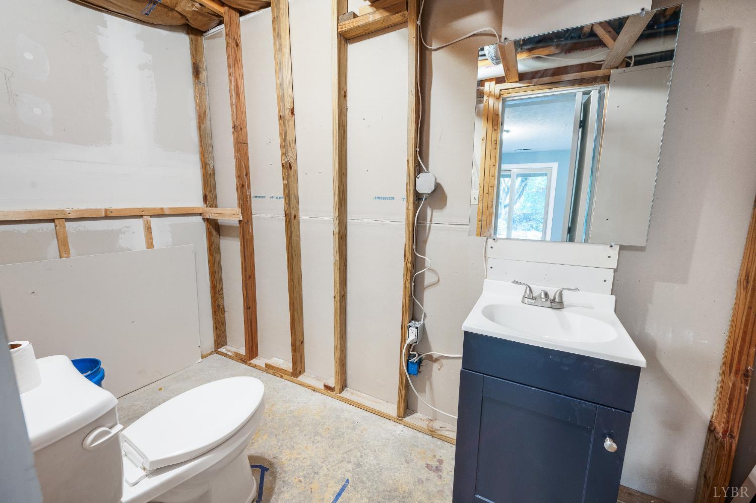 102 Goose Ridge Drive Forest, VA 24551 - Photo 43 of 57 a bathroom with a sink toilet and shower