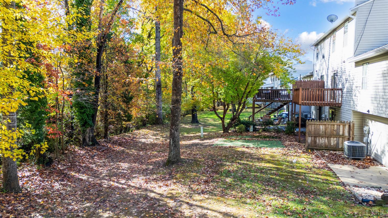102 Goose Ridge Drive Forest, VA 24551 - Photo 8 of 57 a backyard of a house with barbeque oven