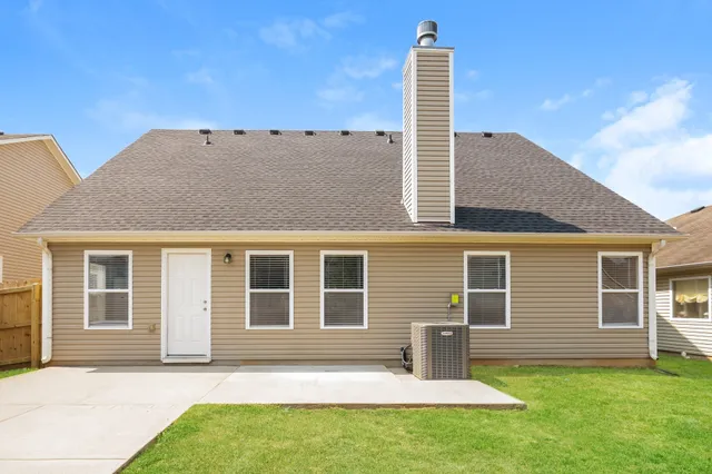 a house view with a garden space
