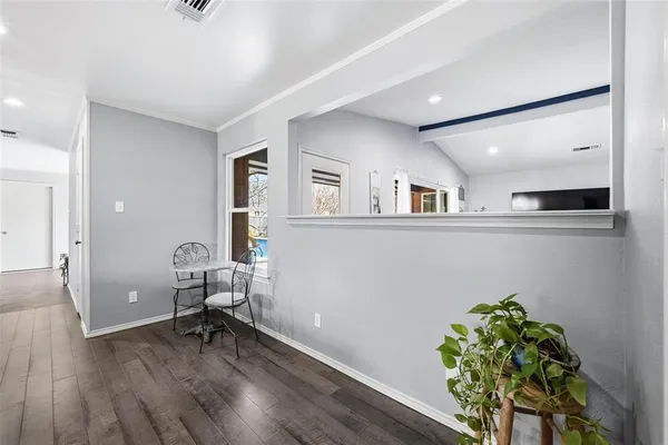 a view of livingroom with furniture and wooden floor