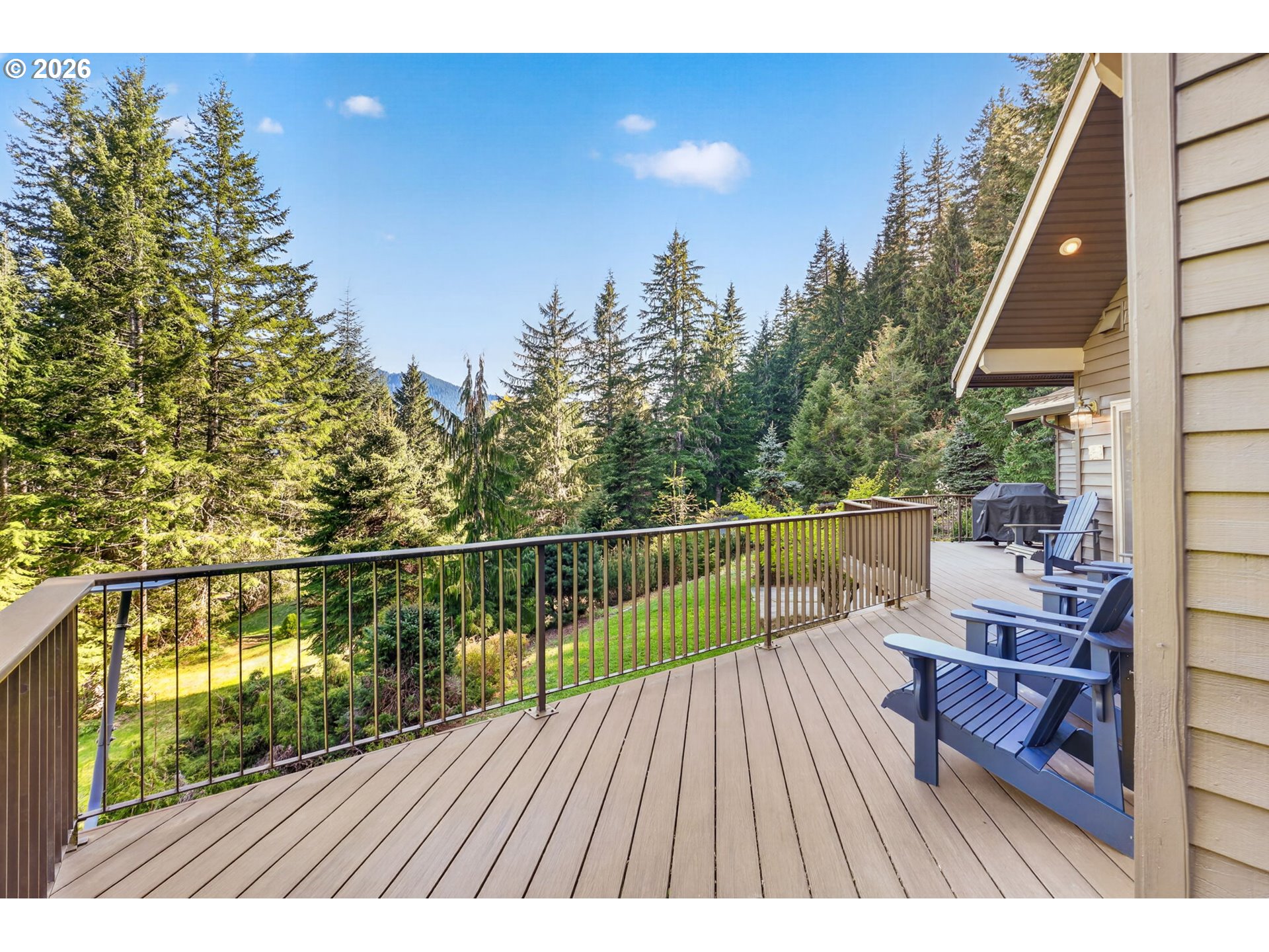 18685 East Aschoff Road Rhododendron, OR 97049 - Photo 27 of 48 a view of balcony with wooden floor and outdoor seating