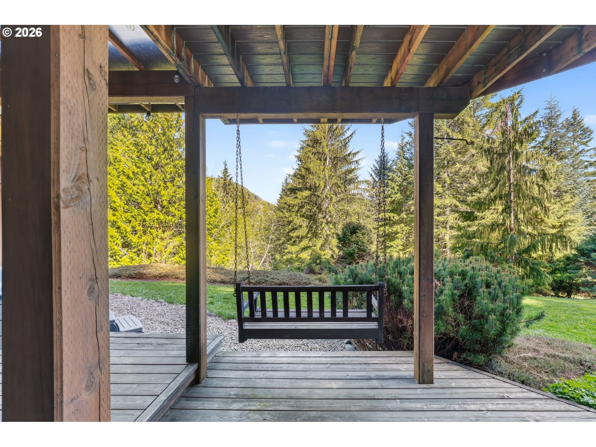 18685 East Aschoff Road Rhododendron, OR 97049 - Photo 34 of 48 a view of a porch with wooden floor and outdoor space