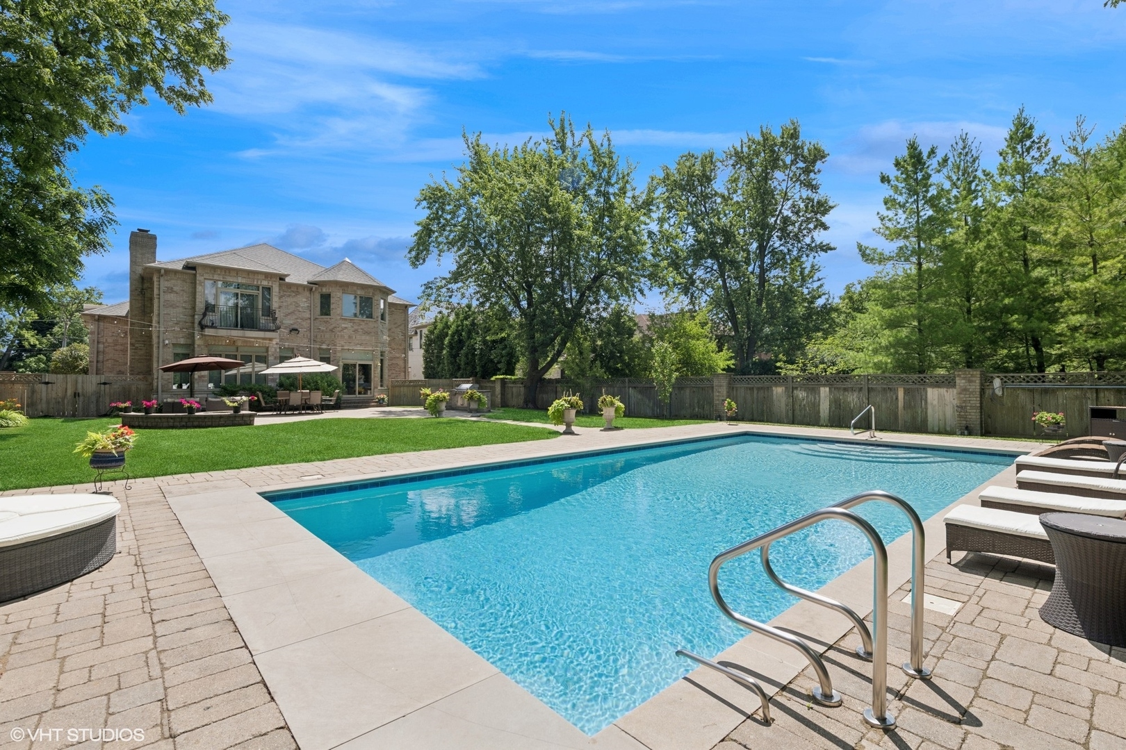 700 Greenwood Road Northbrook, IL 60062 - Photo 4 of 81 a view of outdoor space yard swimming pool and patio