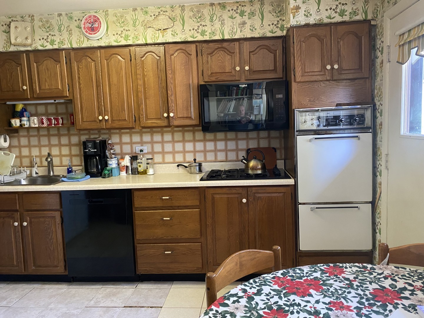 500 Kin Court Wilmette, IL 60091 - Photo 4 of 12 a kitchen with a sink and cabinets