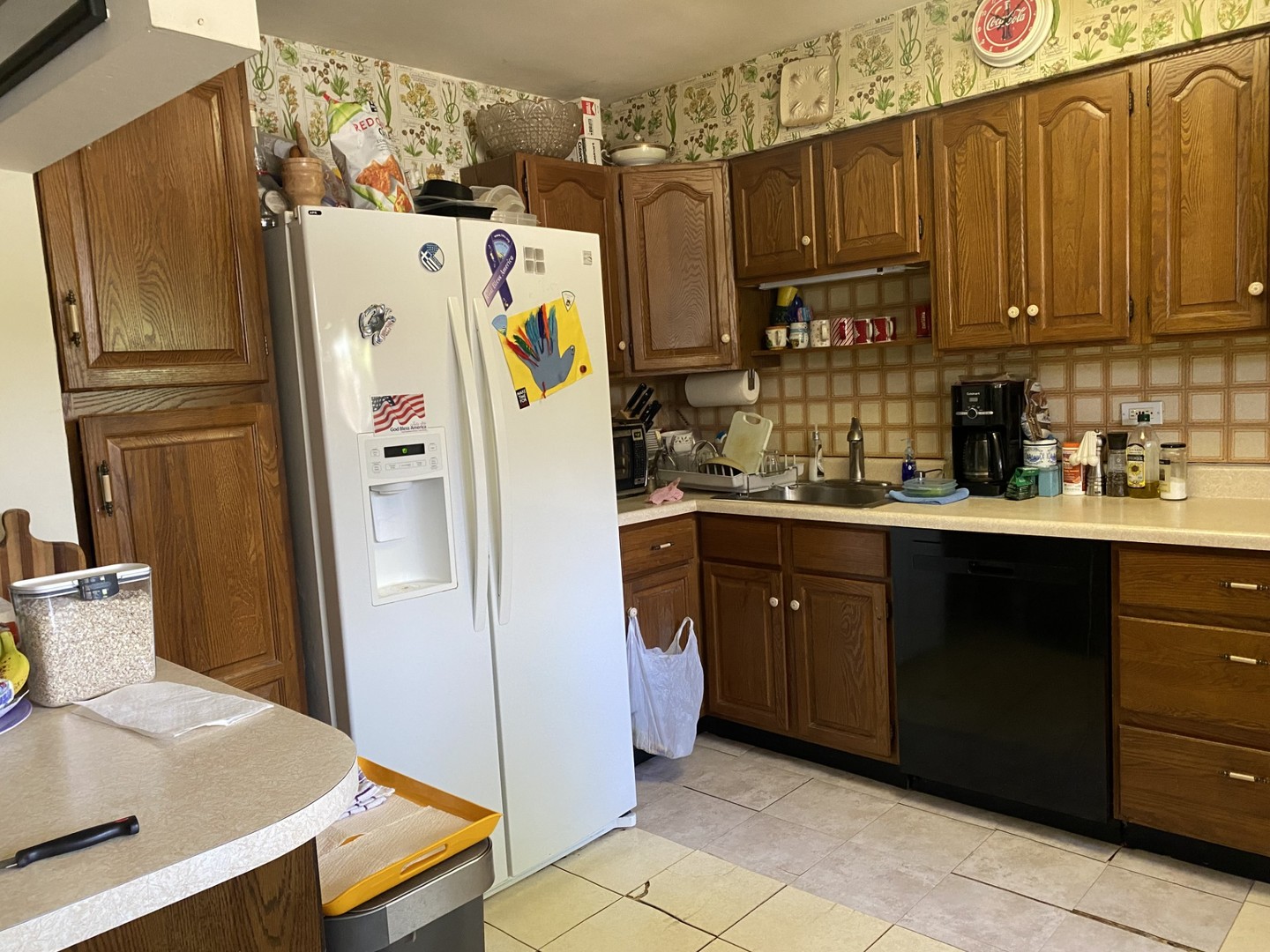 500 Kin Court Wilmette, IL 60091 - Photo 5 of 12 a kitchen with stainless steel appliances granite countertop a refrigerator and a sink
