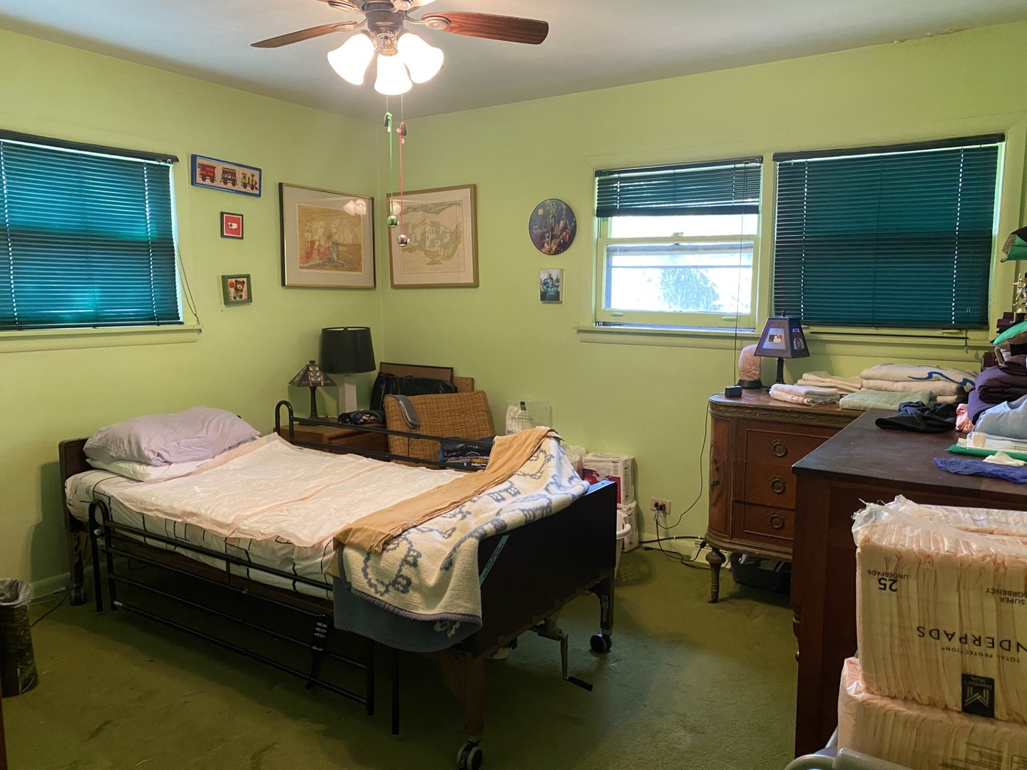 500 Kin Court Wilmette, IL 60091 - Photo 8 of 12 a bedroom with a bed table chair and painting on the wall