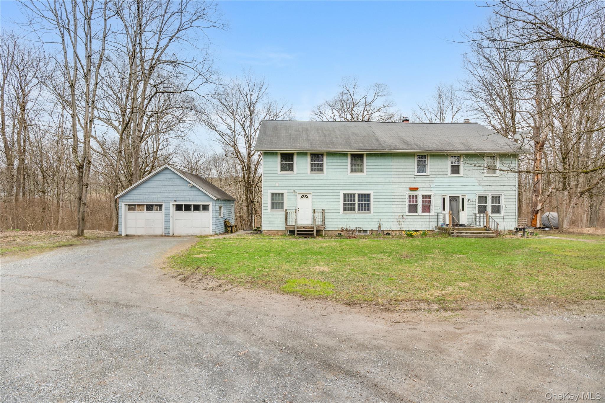 a view of a house with a back yard