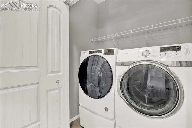 a utility room with dryer and washer