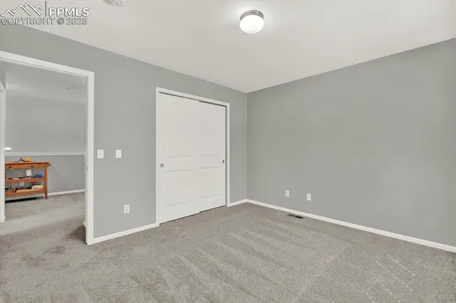 an empty room with an entryway
