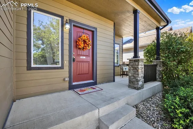 a view of a door and chair in the room