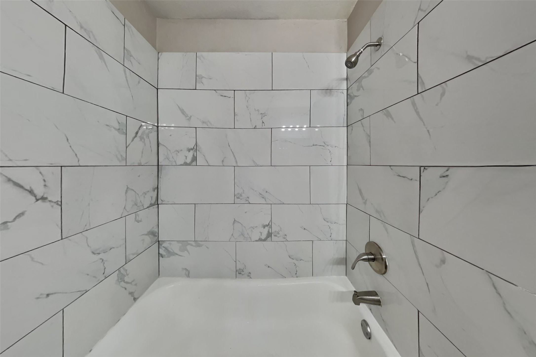 9615 Orangevale Drive Spring, TX 77379 - Photo 19 of 21 a bathroom with a bathtub