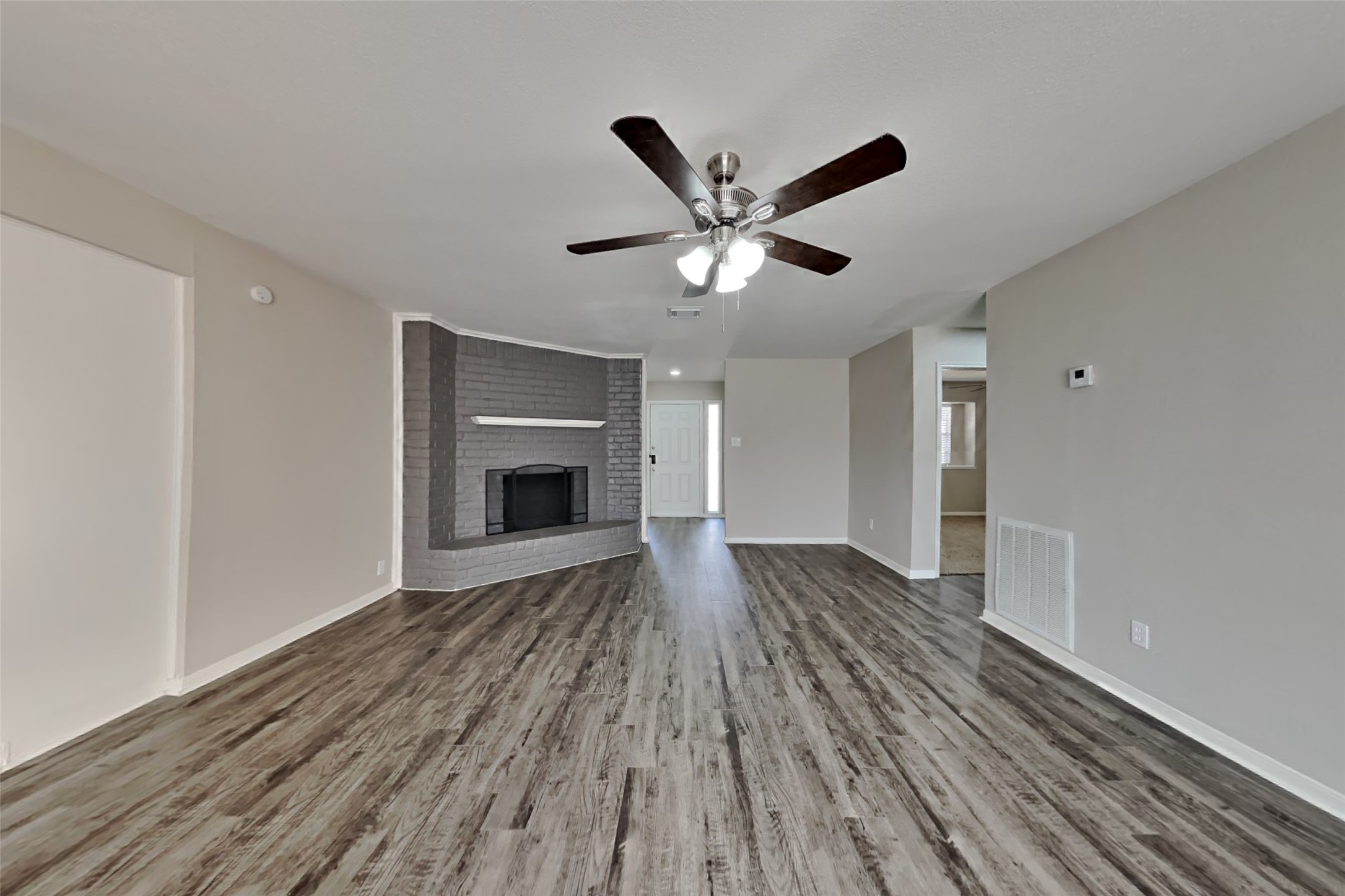 9615 Orangevale Drive Spring, TX 77379 - Photo 2 of 21 a view of an empty room and wooden floor