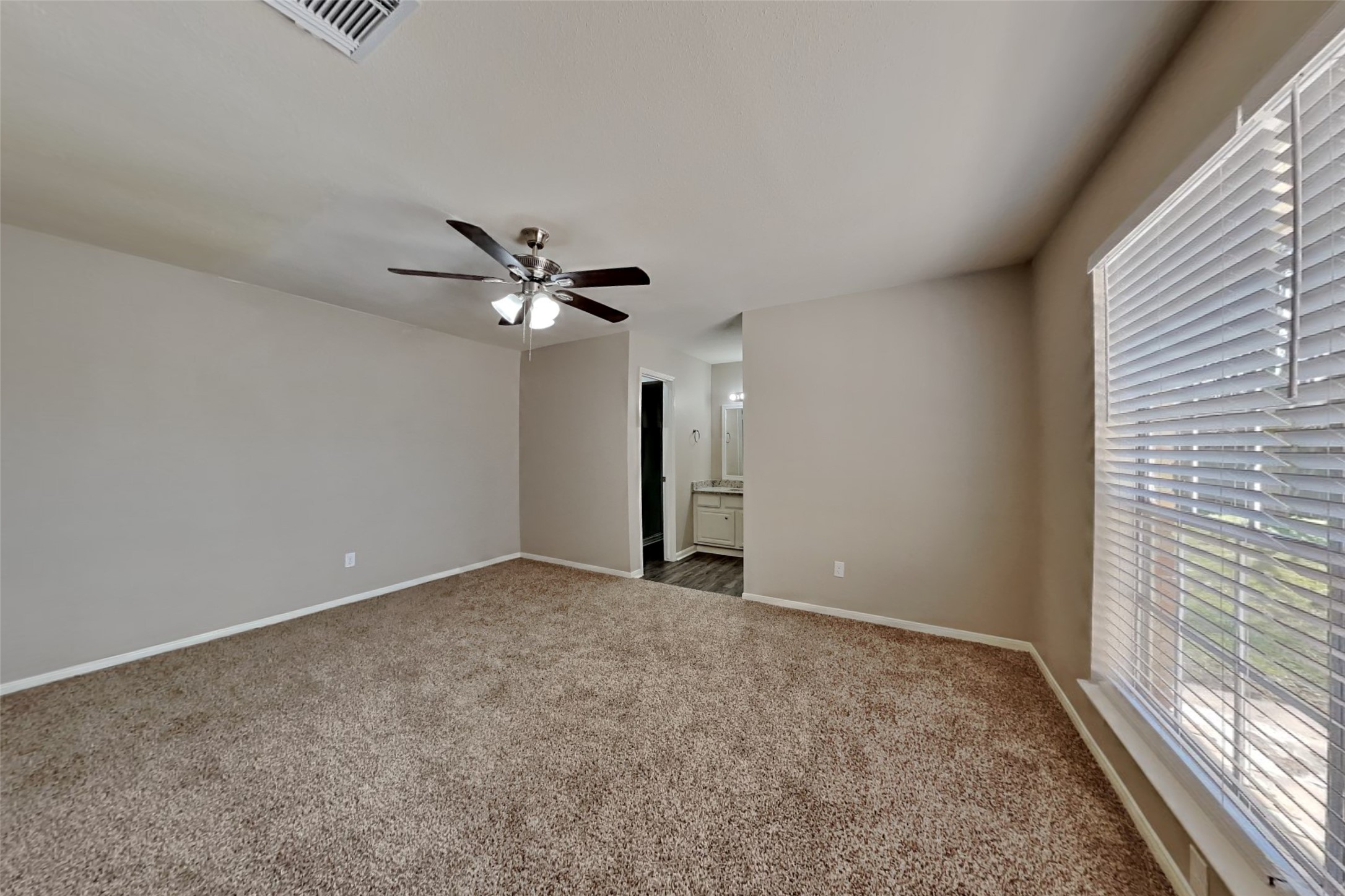 9615 Orangevale Drive Spring, TX 77379 - Photo 10 of 21 a view of an empty room with a window