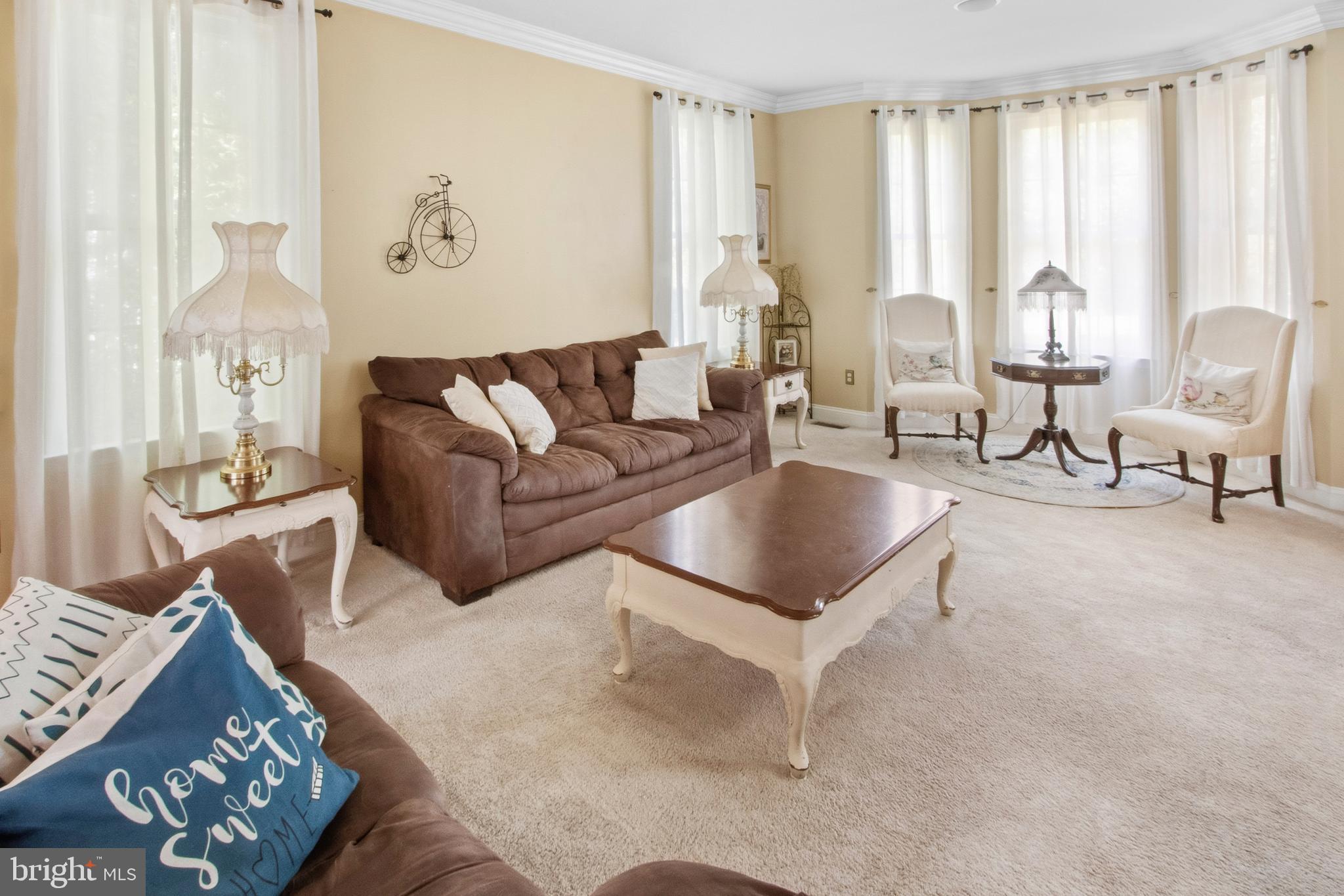 15 Hollybrook Road Mullica Hill, NJ 08062 - Photo 9 of 38 a living room with furniture and a large window