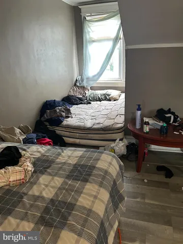 a room with bed and window