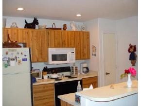 3220 Wasatch Court Prescott, AZ 86301 - Photo 6 of 10 a kitchen with a sink a stove and cabinets