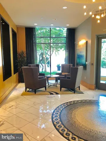 a view of a living room and dining room