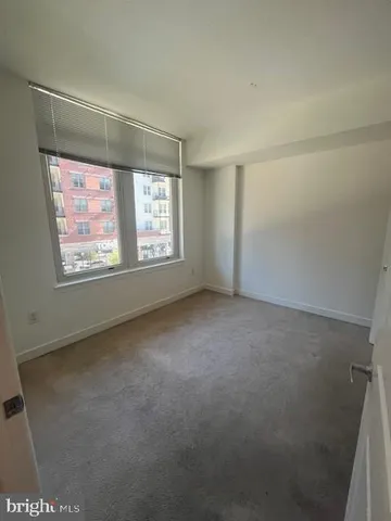 a view of storage and utility room with empty racks