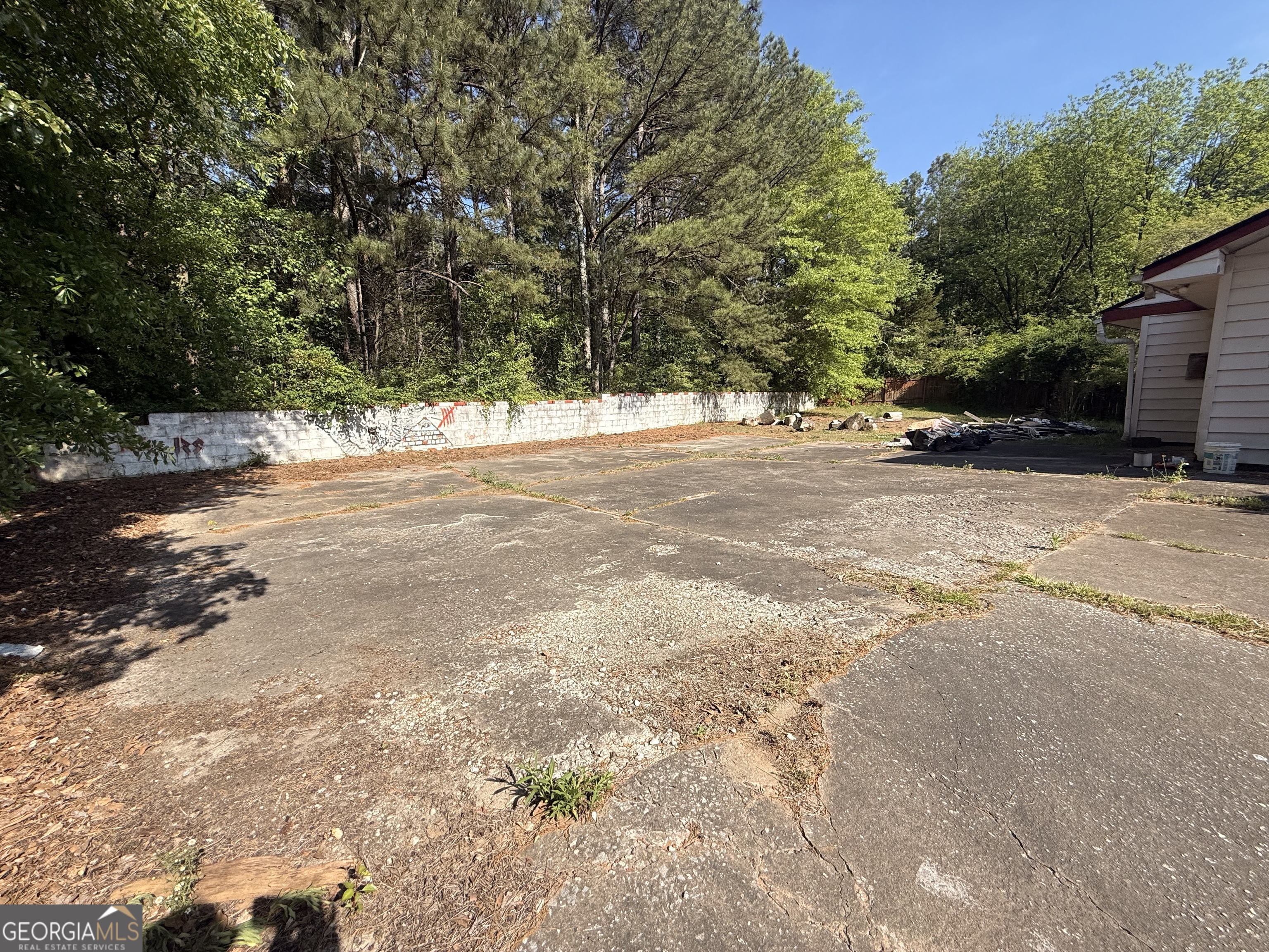 6750 Maddox Road Morrow, GA 30260 - Photo 11 of 11 a view of a yard with a tree