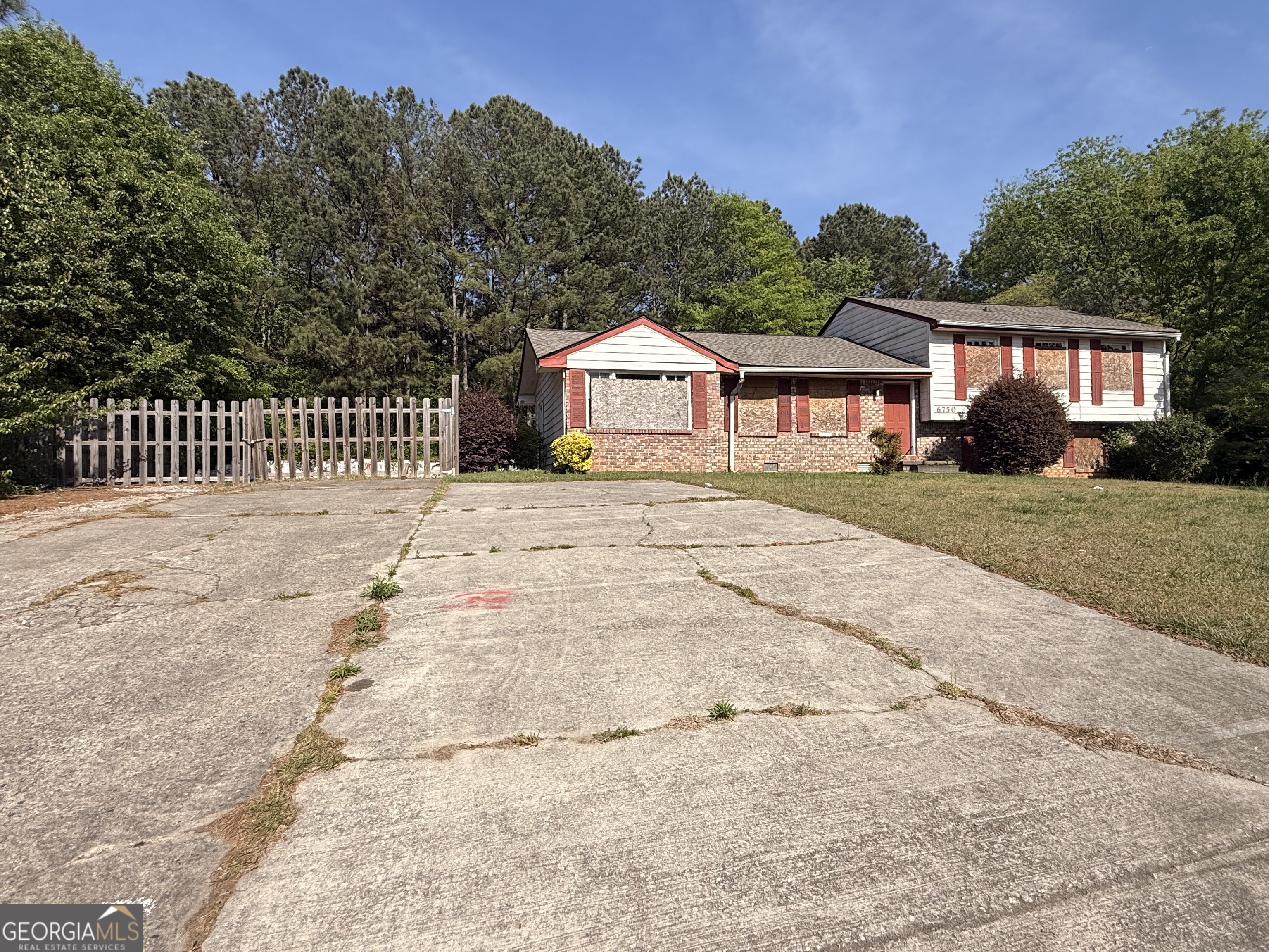 6750 Maddox Road Morrow, GA 30260 - Photo 2 of 11 a front view of a house with a yard