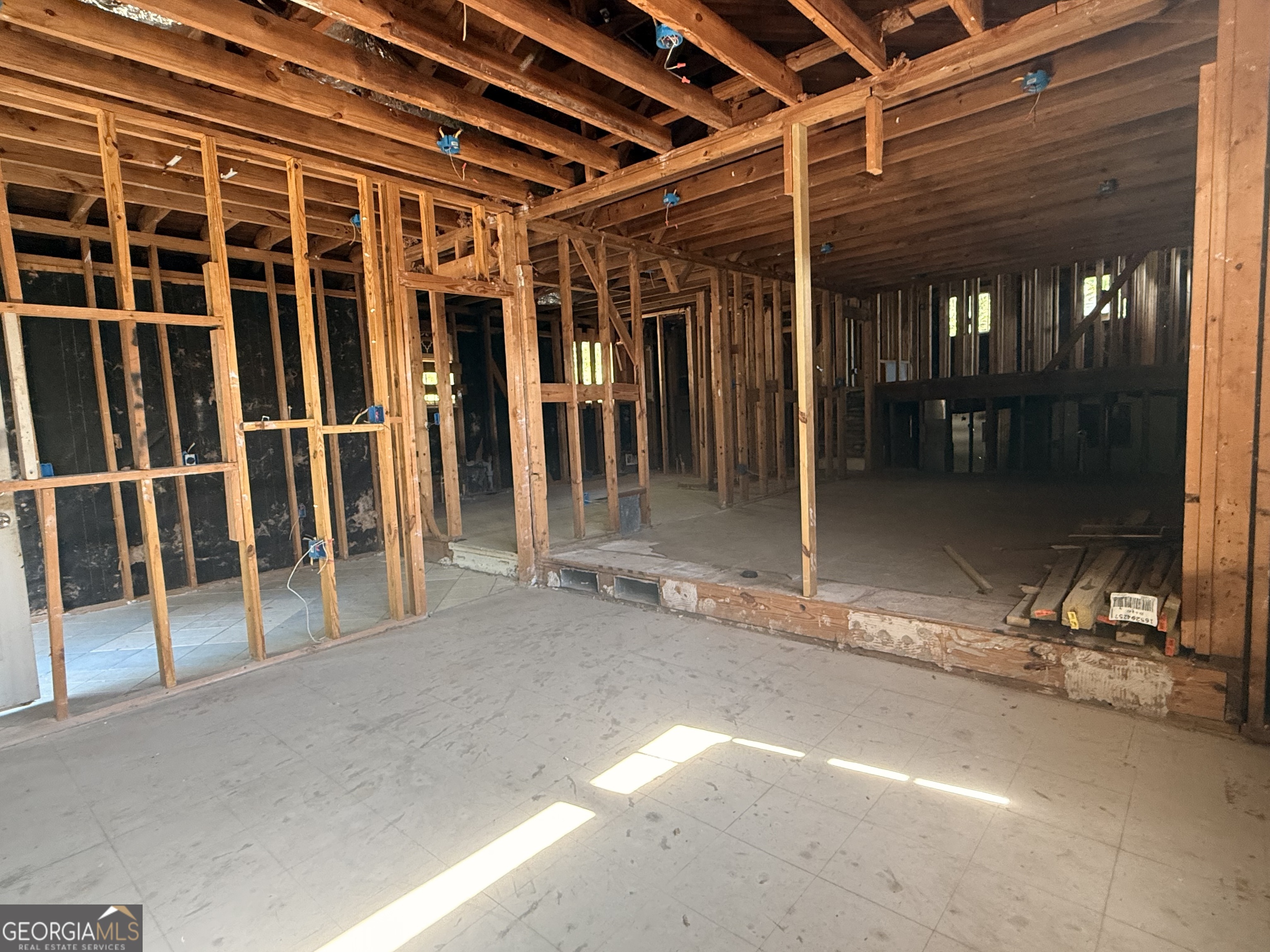 6750 Maddox Road Morrow, GA 30260 - Photo 8 of 11 a view of a room with wooden floor