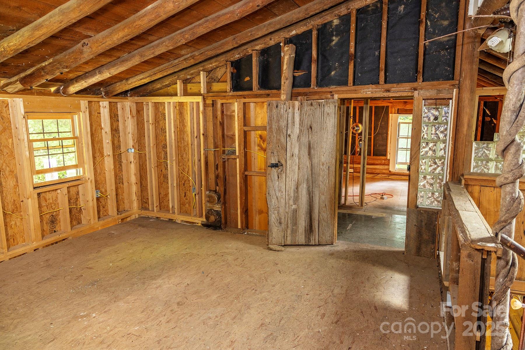 1710 Roaring Fork Road Mars Hill, NC 28754 - Photo 11 of 20 a view of an empty room with a window