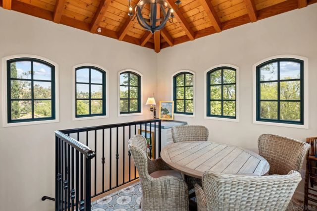 a balcony with furniture and window