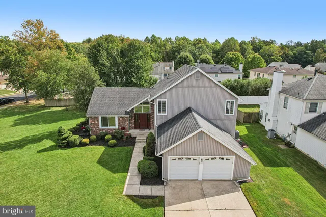 a view of a house with a big yard