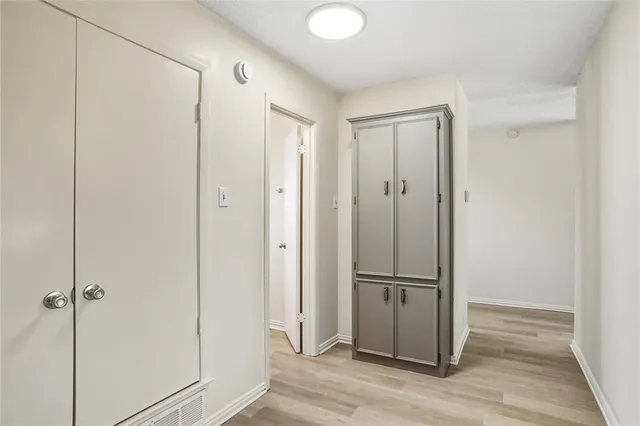 a view of a bathroom with wooden floor
