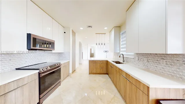 a view of entryway with wooden floor and stairs