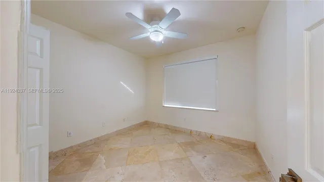a bathroom with a sink vanity granite tub and shower