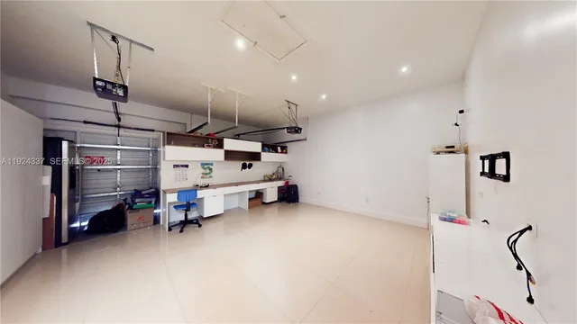 a view of a white house with a large windows