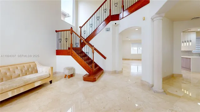a view of entryway livingroom and hall