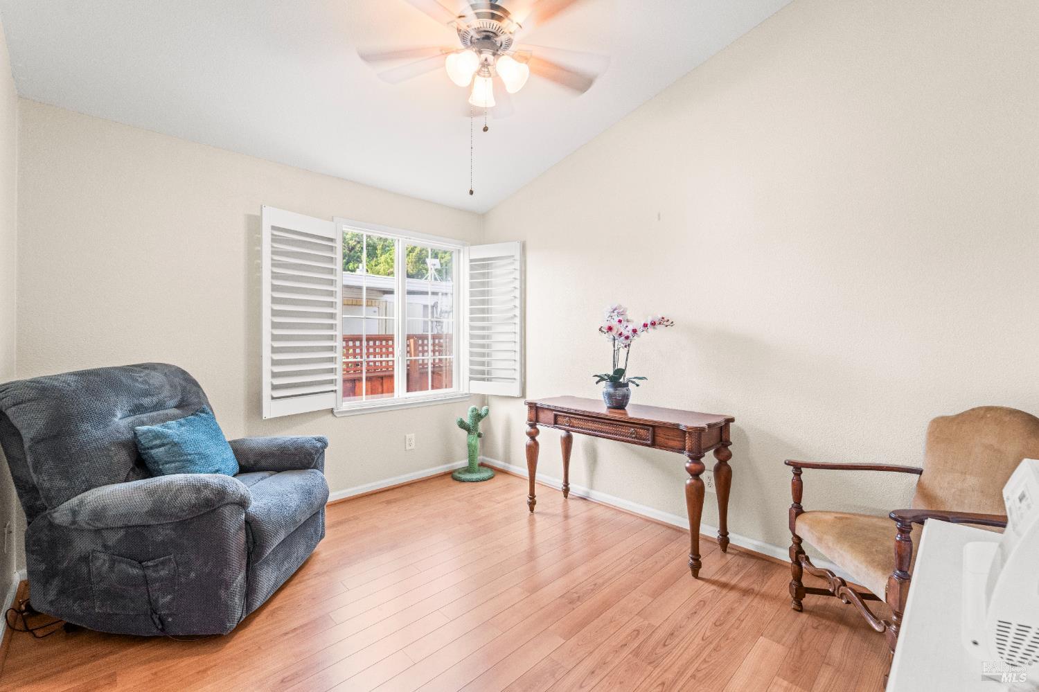 150 Silverado Trail, Unit 40 Napa, CA 94559 - Photo 15 of 40 a living room with furniture and a large window