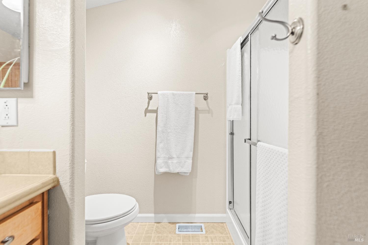 150 Silverado Trail, Unit 40 Napa, CA 94559 - Photo 24 of 40 a bathroom with a toilet and a shower