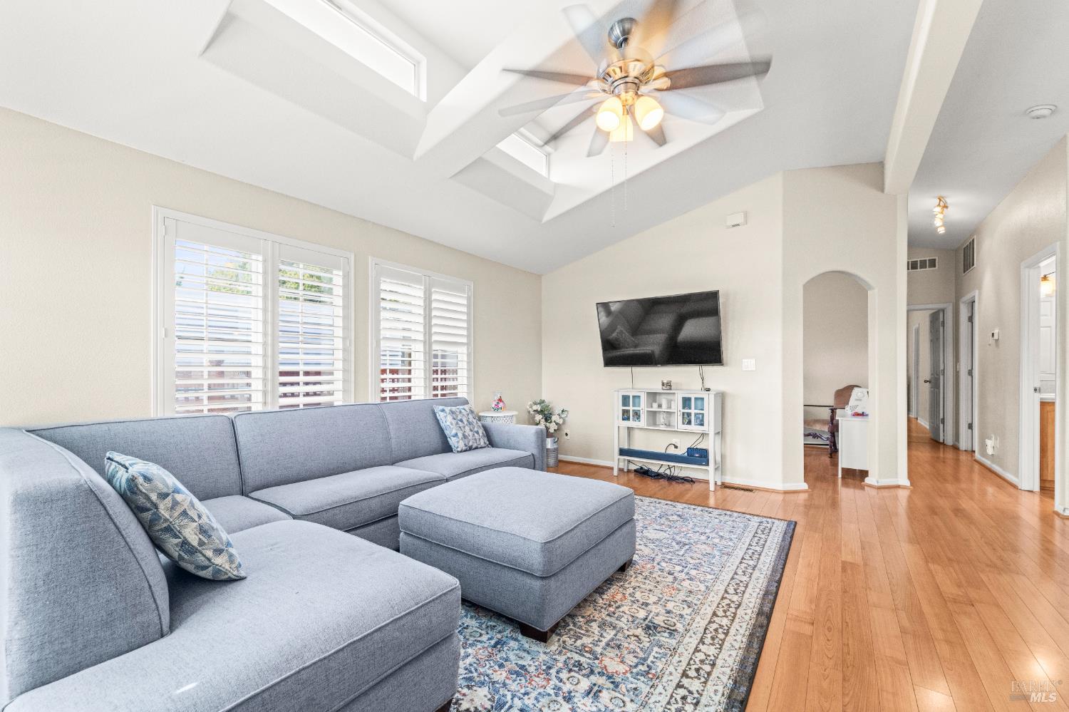 150 Silverado Trail, Unit 40 Napa, CA 94559 - Photo 4 of 40 a living room with furniture and a flat screen tv