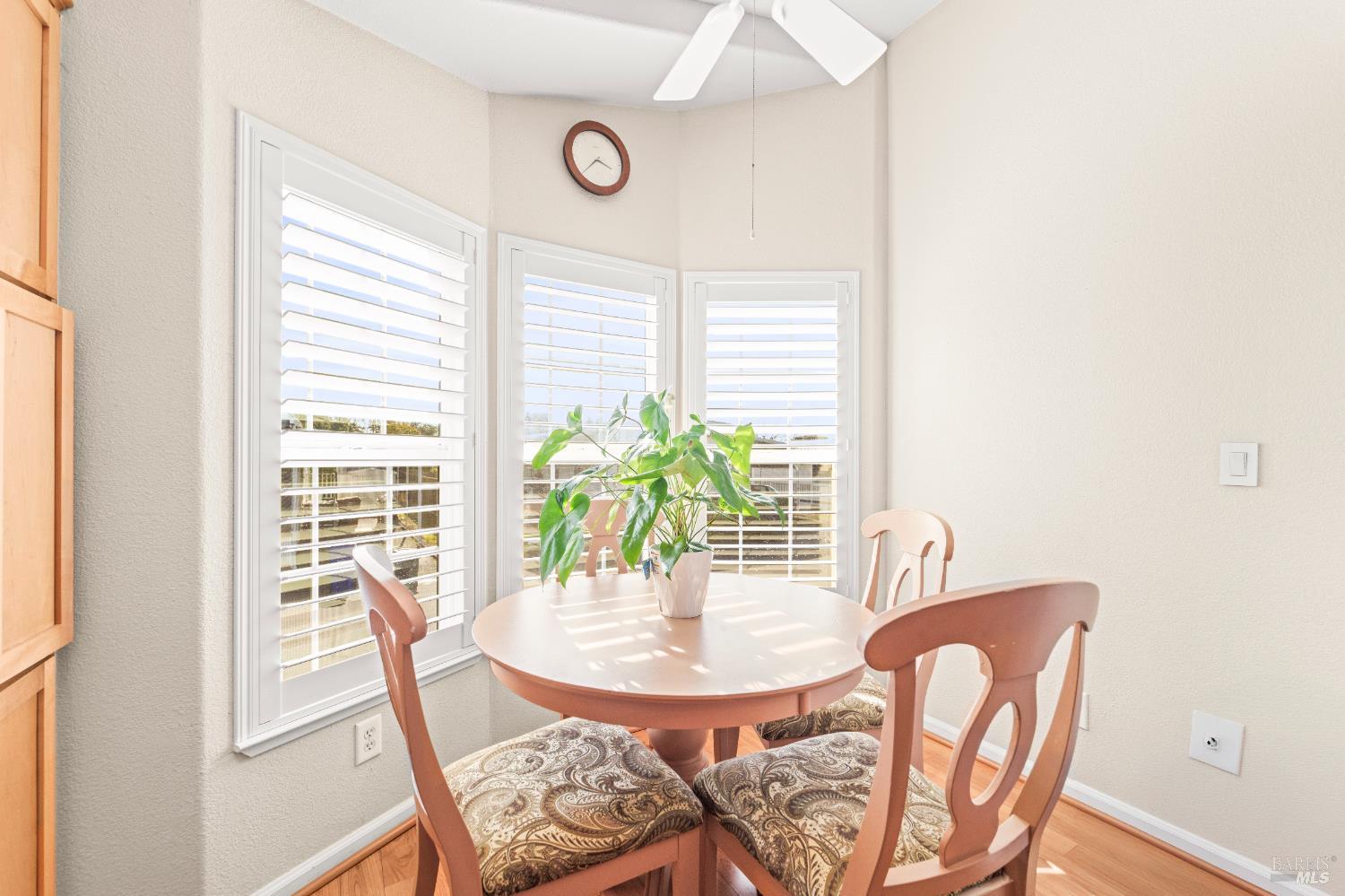 150 Silverado Trail, Unit 40 Napa, CA 94559 - Photo 9 of 40 a view of a dining room with furniture and a potted plant