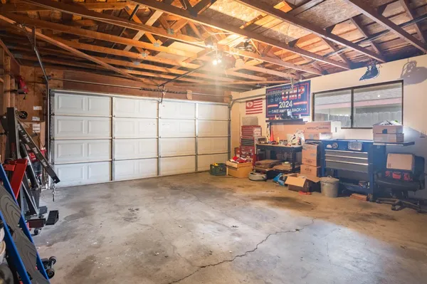 a view of a garage room with stairs